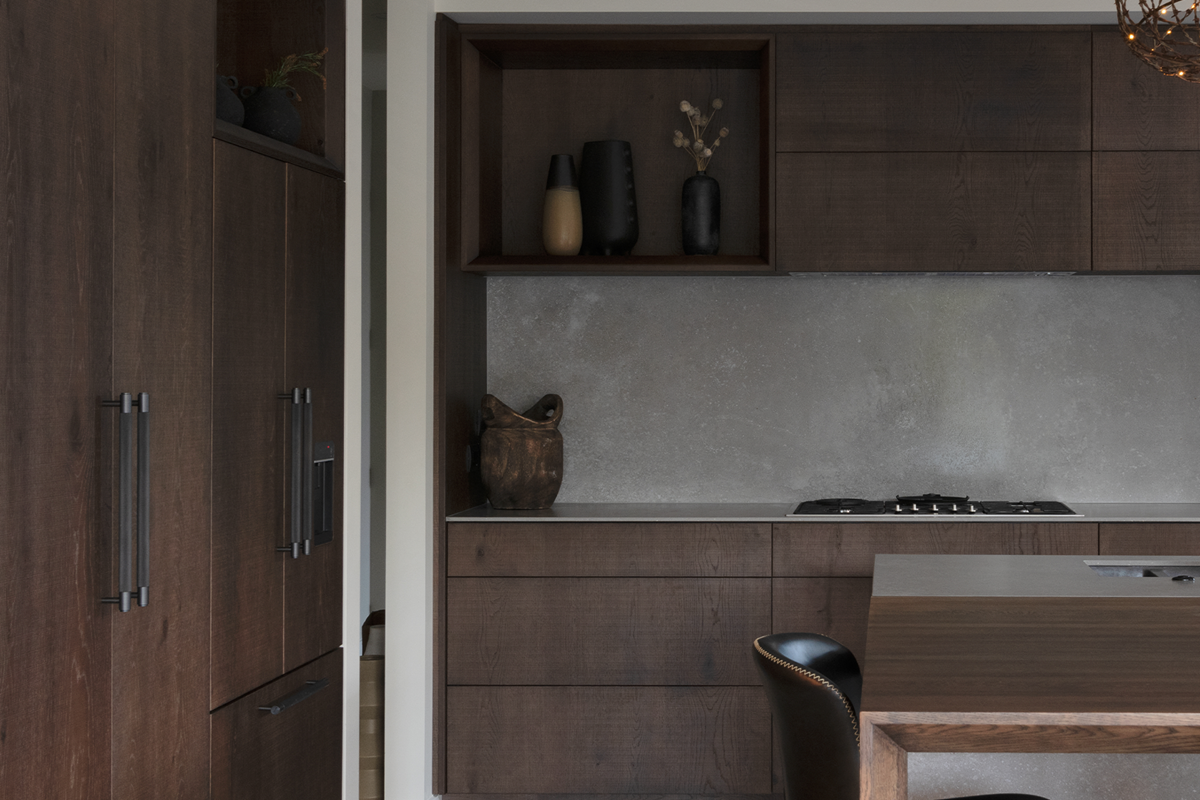 earthy kitchen with dark timber veneer cabinetry